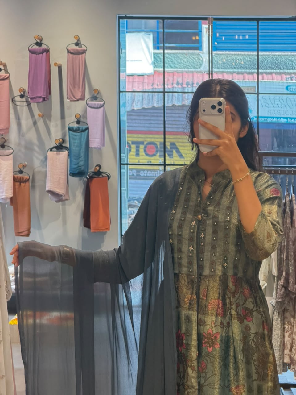Floral Elegance – Issu Silk Gown with a Graceful Drape