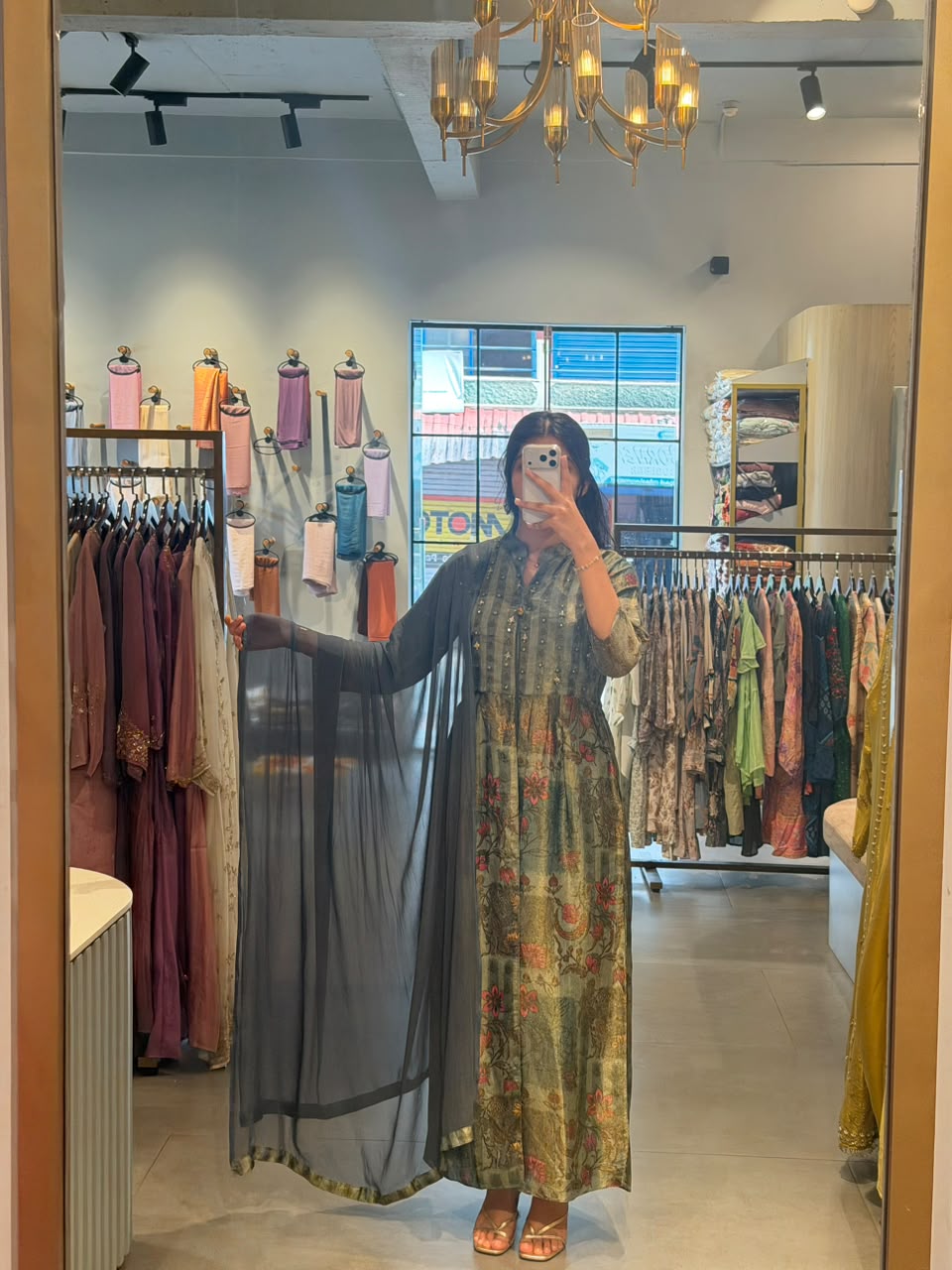 Floral Elegance – Issu Silk Gown with a Graceful Drape
