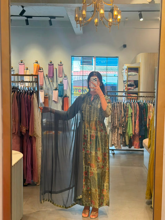 Floral Elegance – Issu Silk Gown with a Graceful Drape