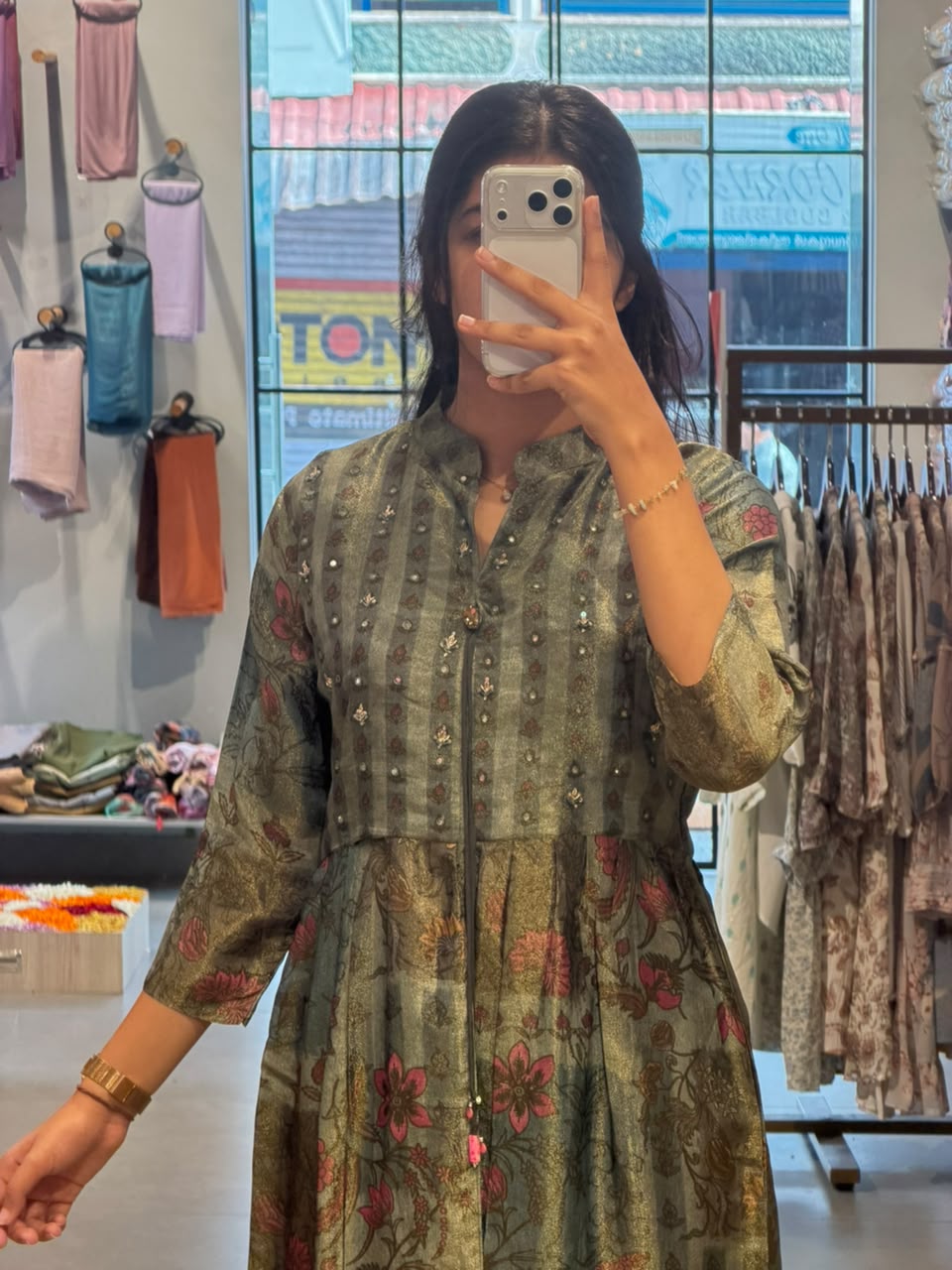 Floral Elegance – Issu Silk Gown with a Graceful Drape